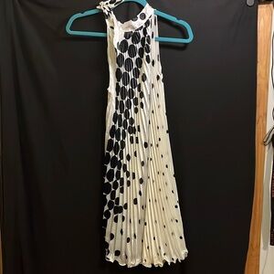 White and black polka dot cocktail dress
